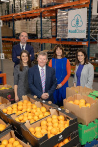 AIB Rethink Ireland and FoodCloud representatives in FoodCloud warehouse 