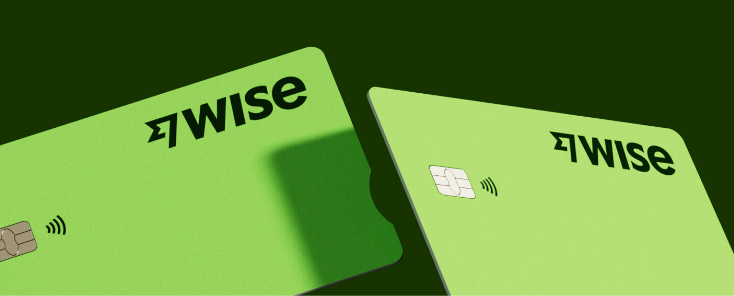Intuit QuickBooks logo with a green qb icon on a blue gradient background with question marks.