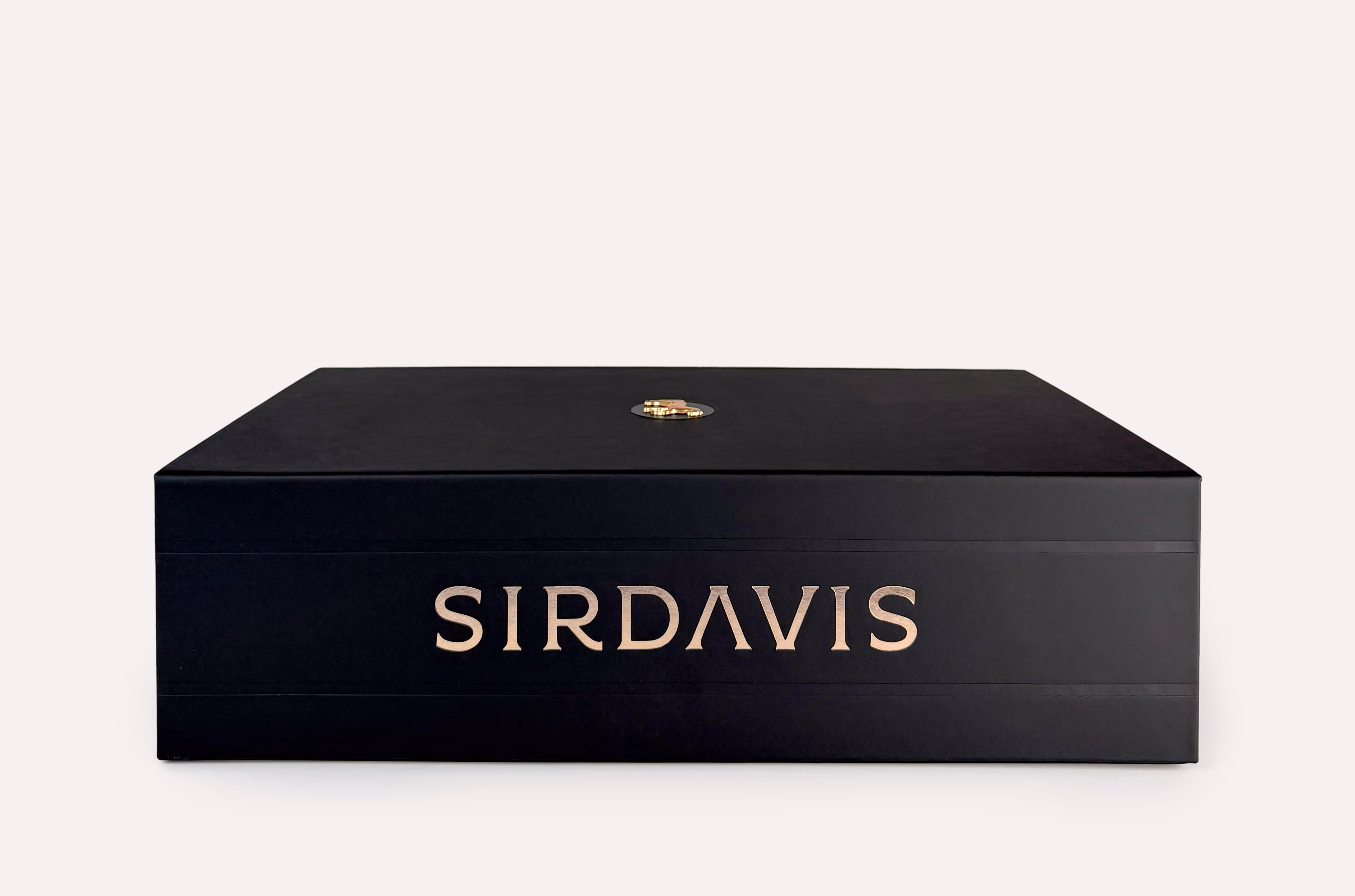Side view of a SirDavis cocktail kit with the detailed gold foil logotype.