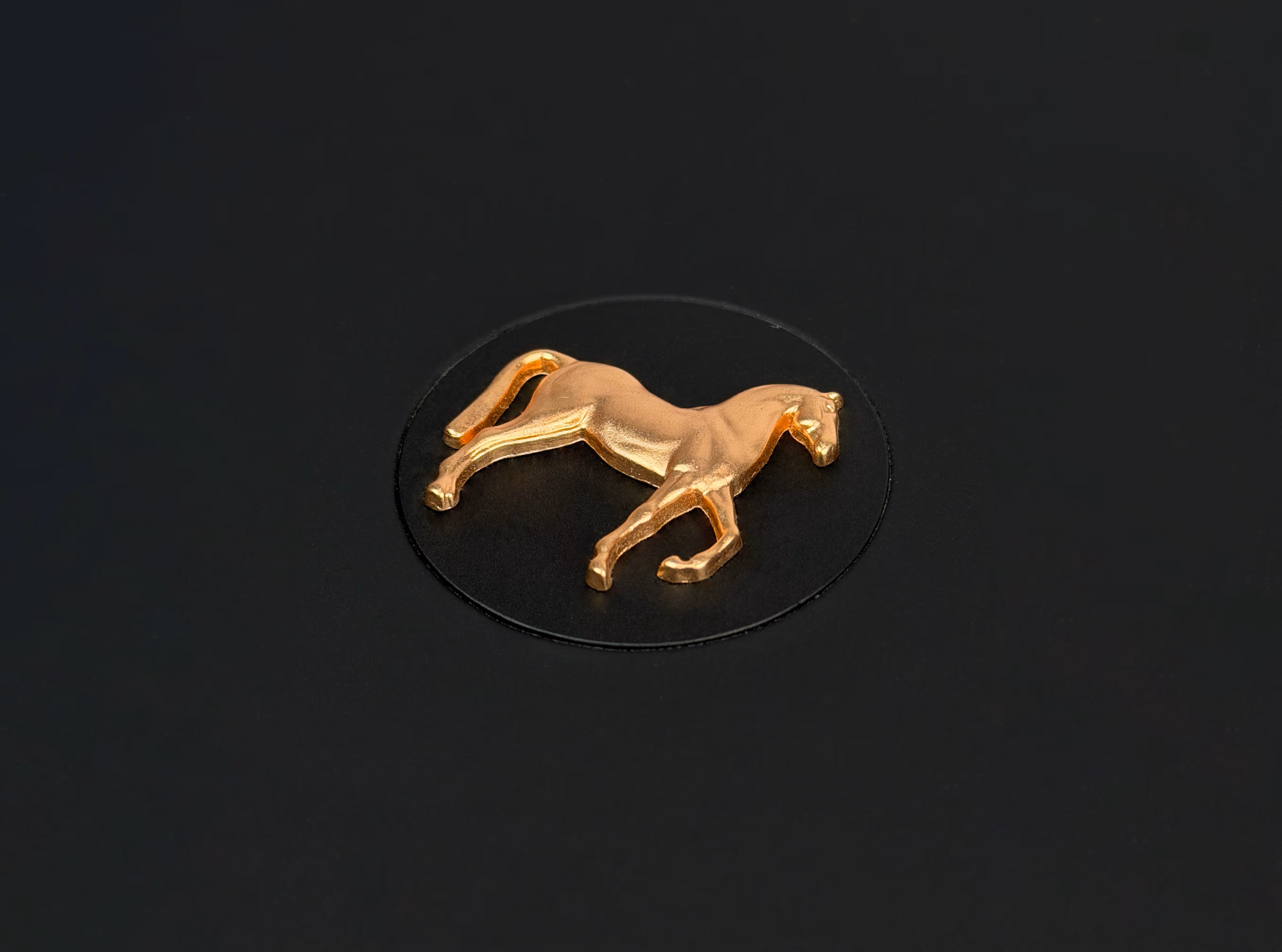 Closeup of the branded brass horse medallion from SirDavis.
