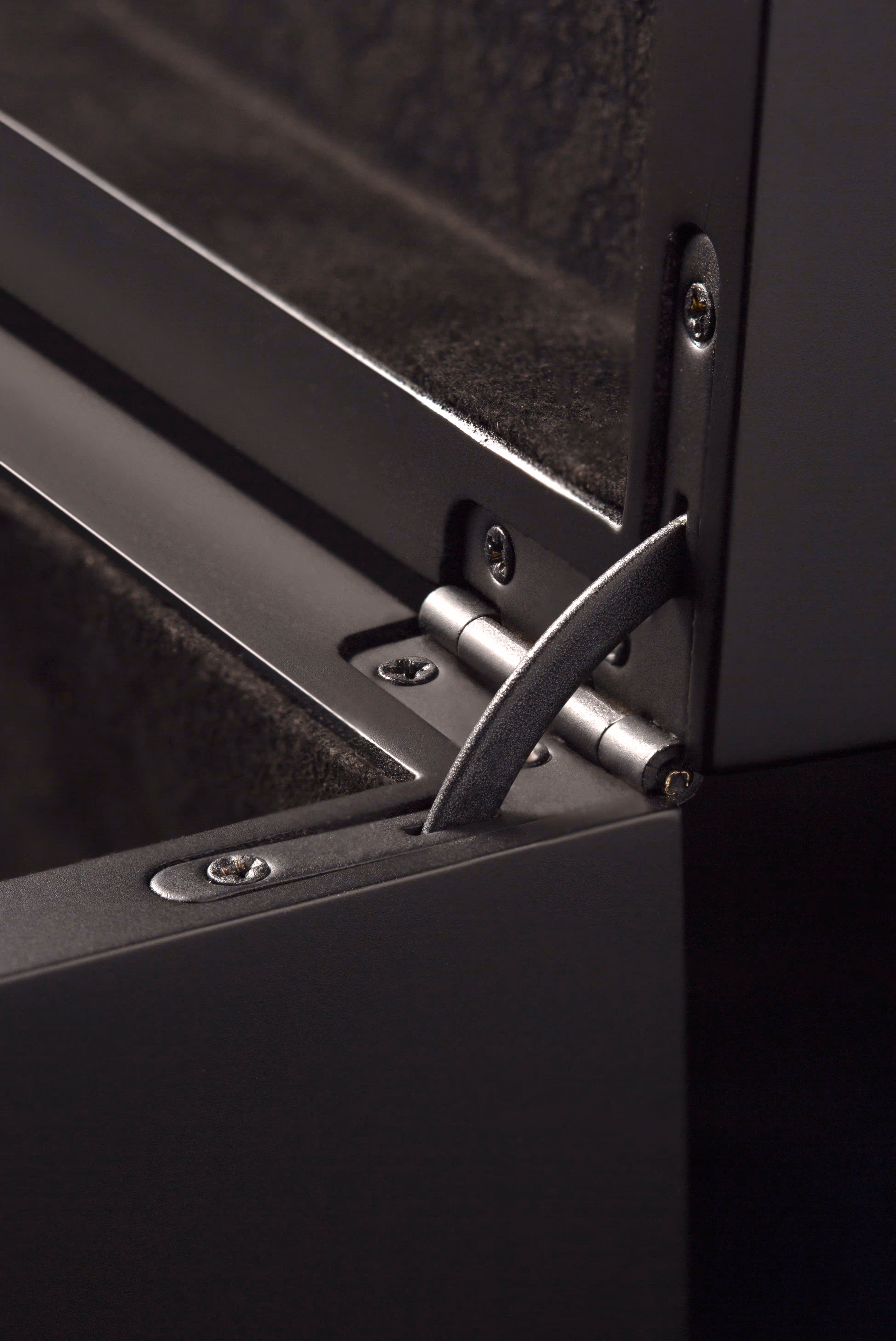 Closeup of the black metal hinge from the All Black BioHorn display box.