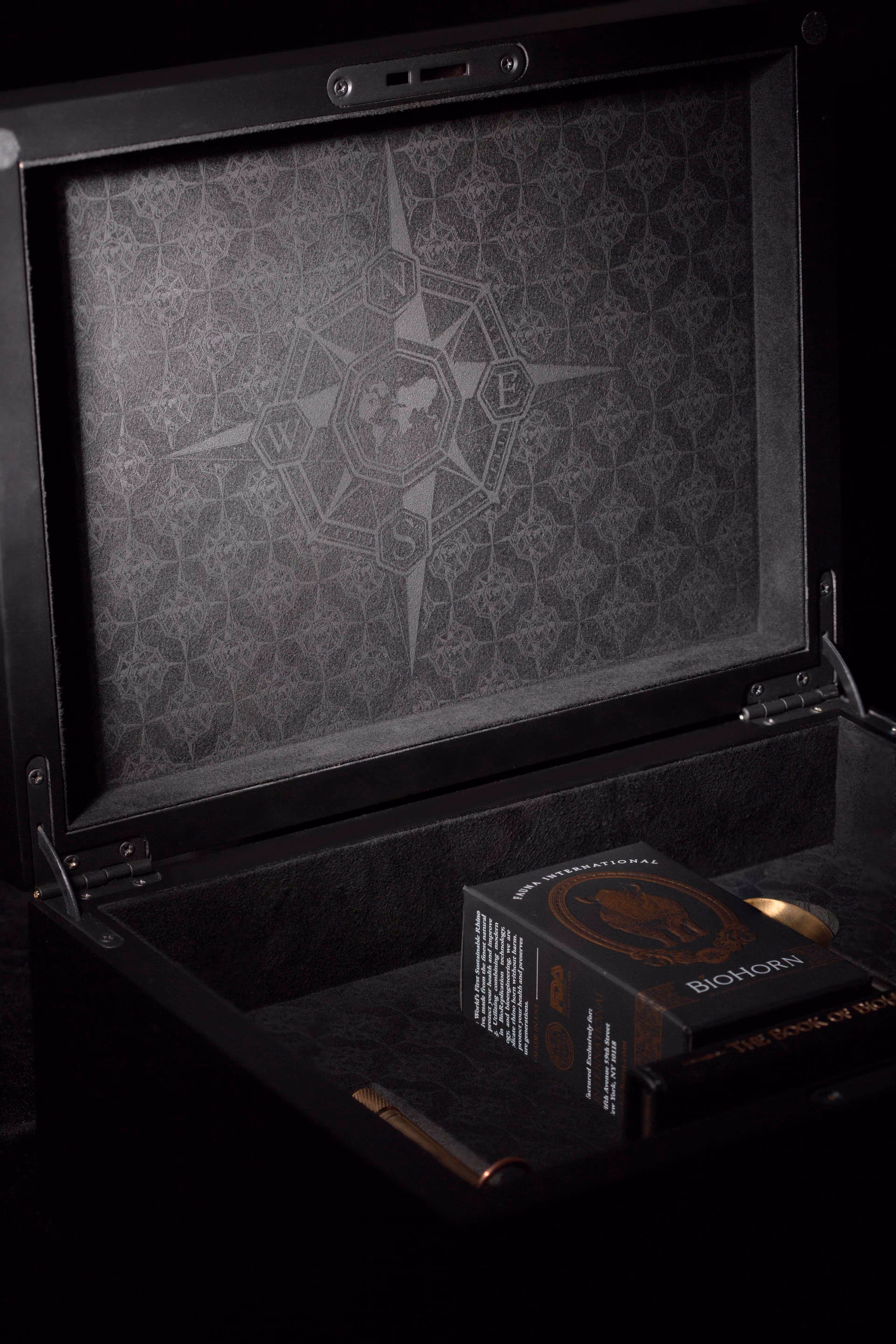 Detailed lasered compass pattern on the inside lid of the BioHorn display box.