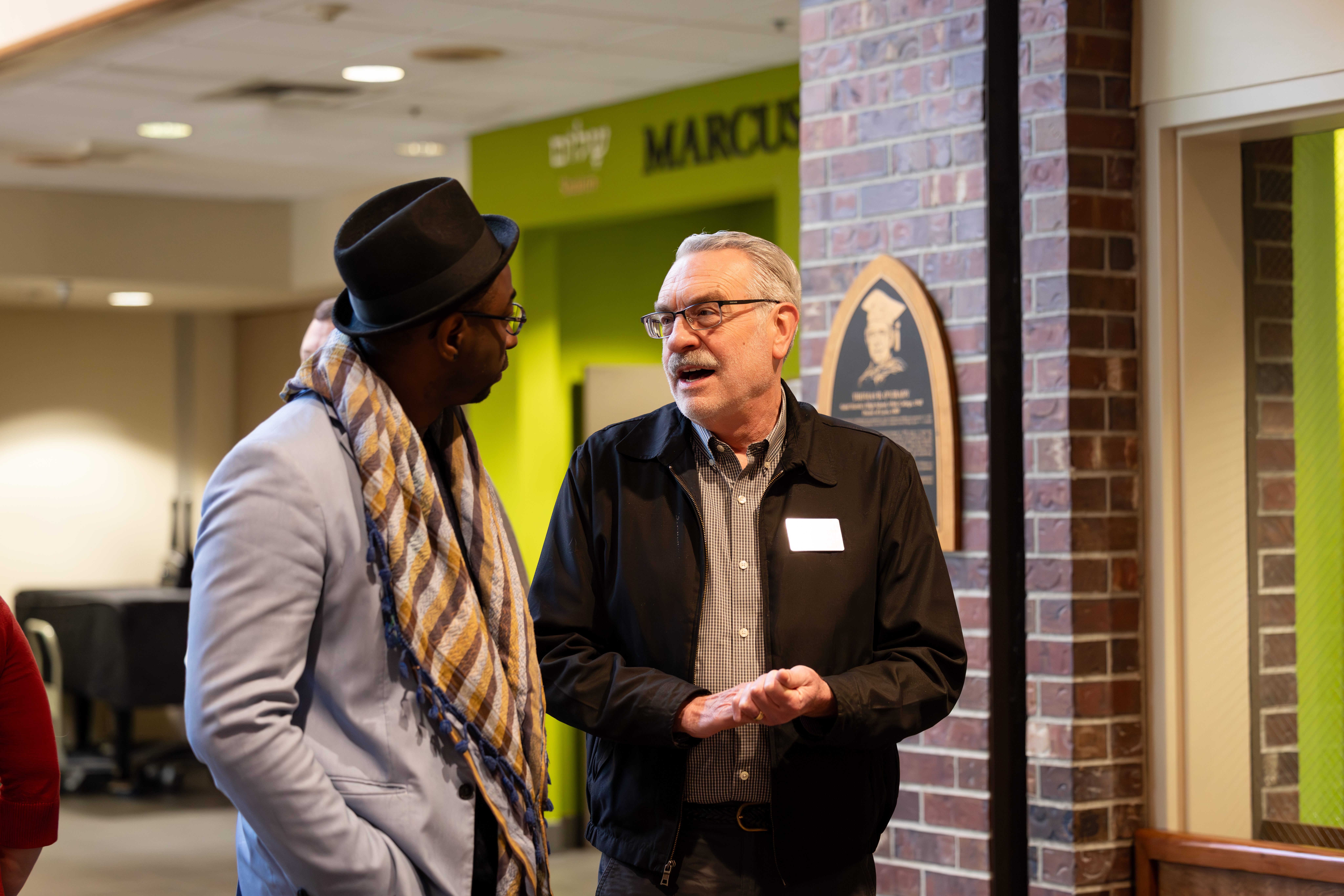 Parfait having a conversation with a man