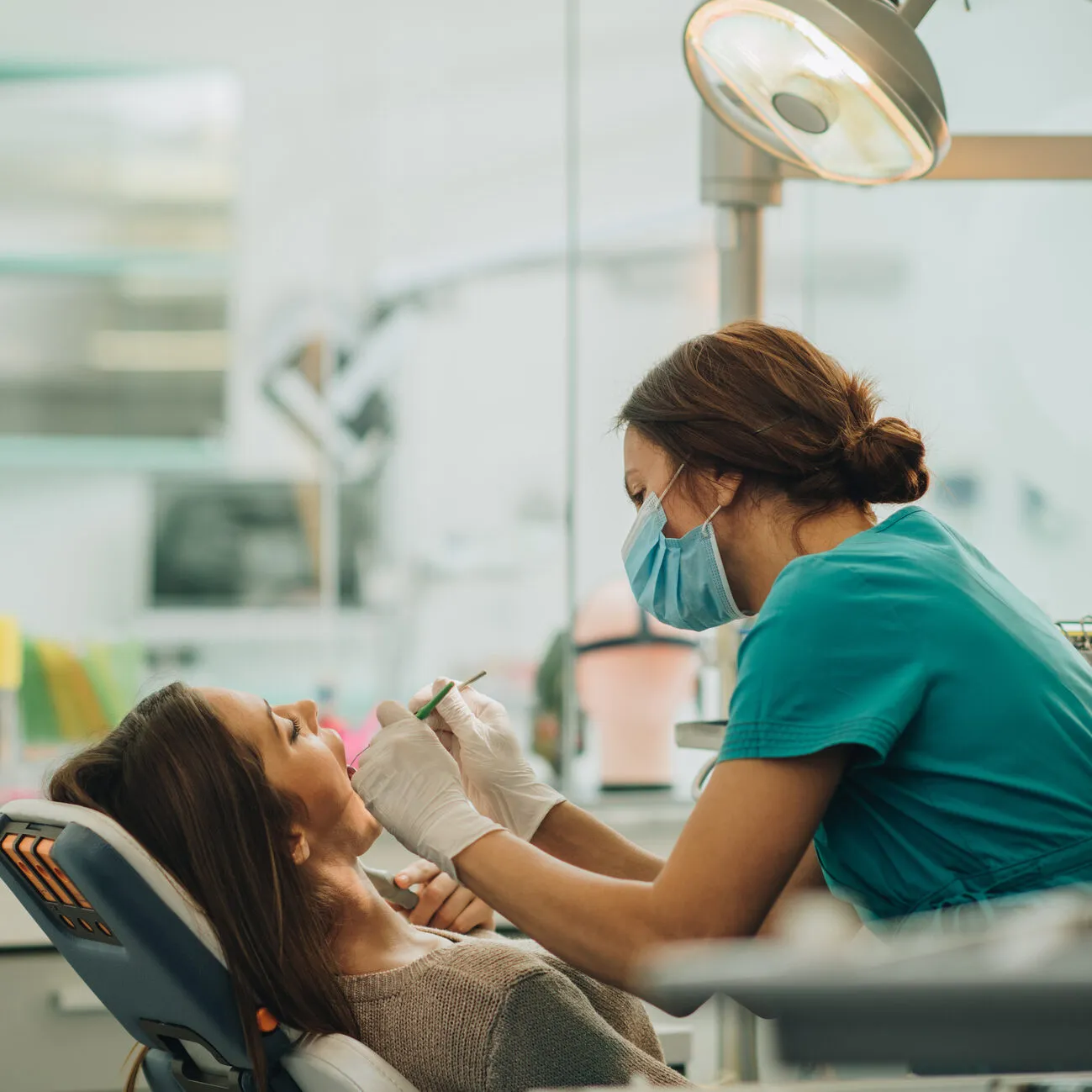 Dr. Lena Khan caring for a patient