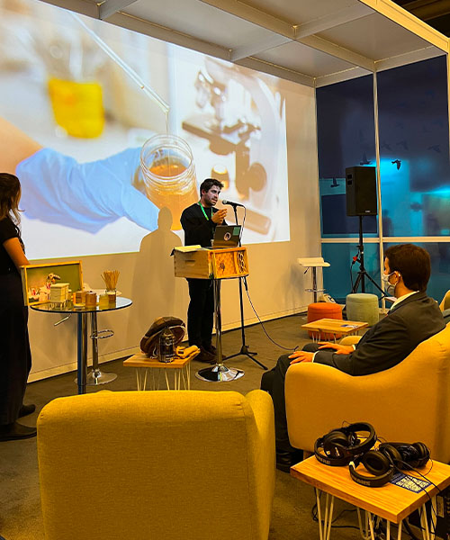 Alex Mclean gives a presentation during COP15 biodiversity conference. urban biodiversity in real estate