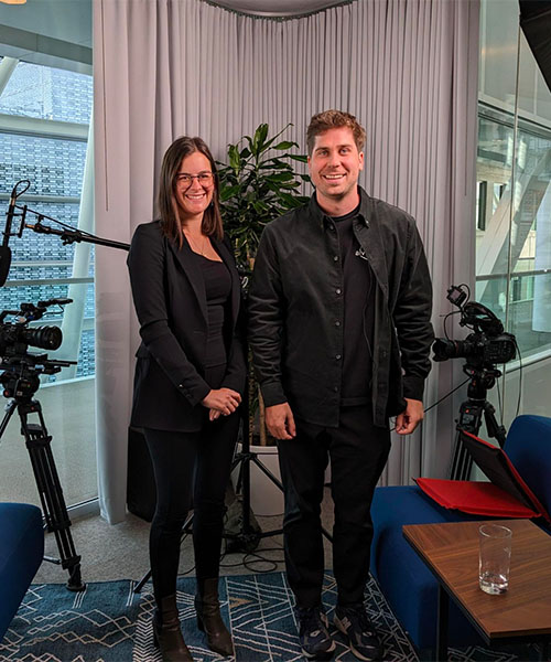 Rebecca Jinks and Alex Mclean standing side by side, smiling . urban biodiversity in real estate