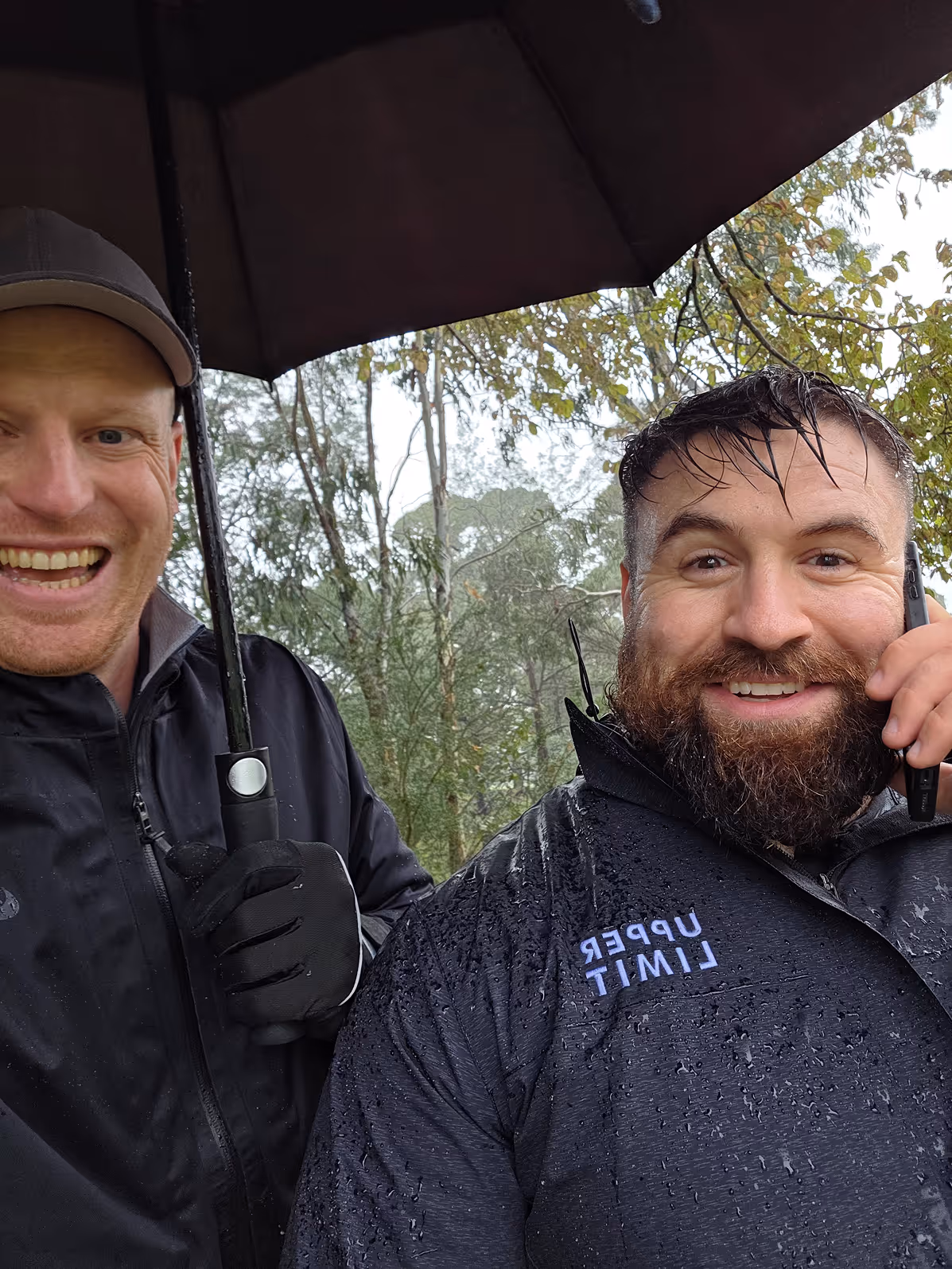 Jake and his client are outdoors during a business coaching session.