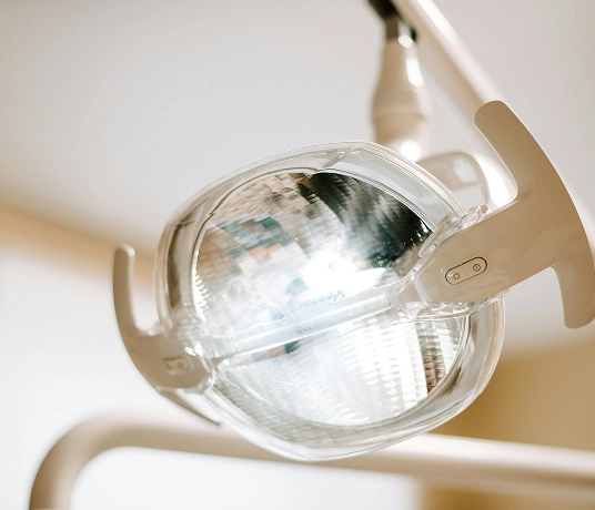 Close-up of a dental overhead light used to illuminate patients during dental exams.