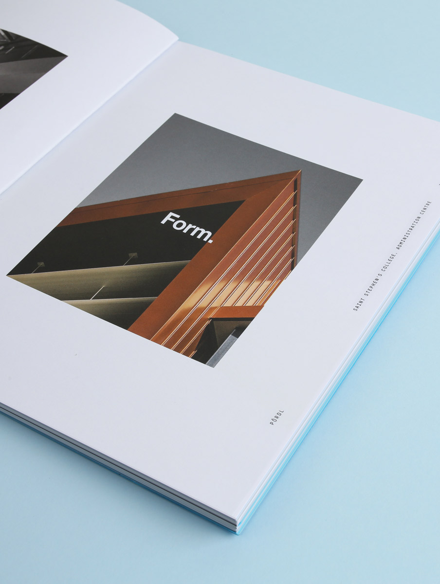 Burling Brown Brand image. Open book showing a photo of a modern building corner with orange and black color, featuring the word 'Form.'