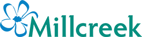 Millcreek logo featuring a blue stylized flower to the left of the green text 'Millcreek'.