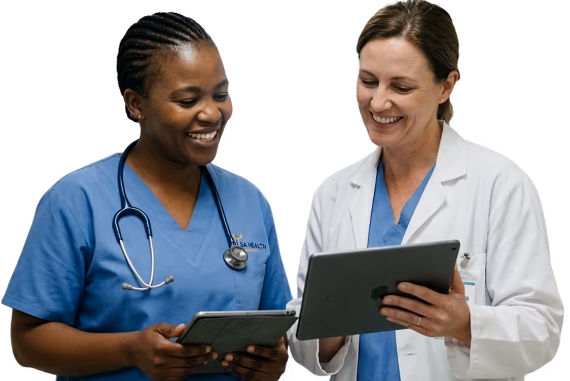 Two doctors smiling and reviewing information on tablets together.