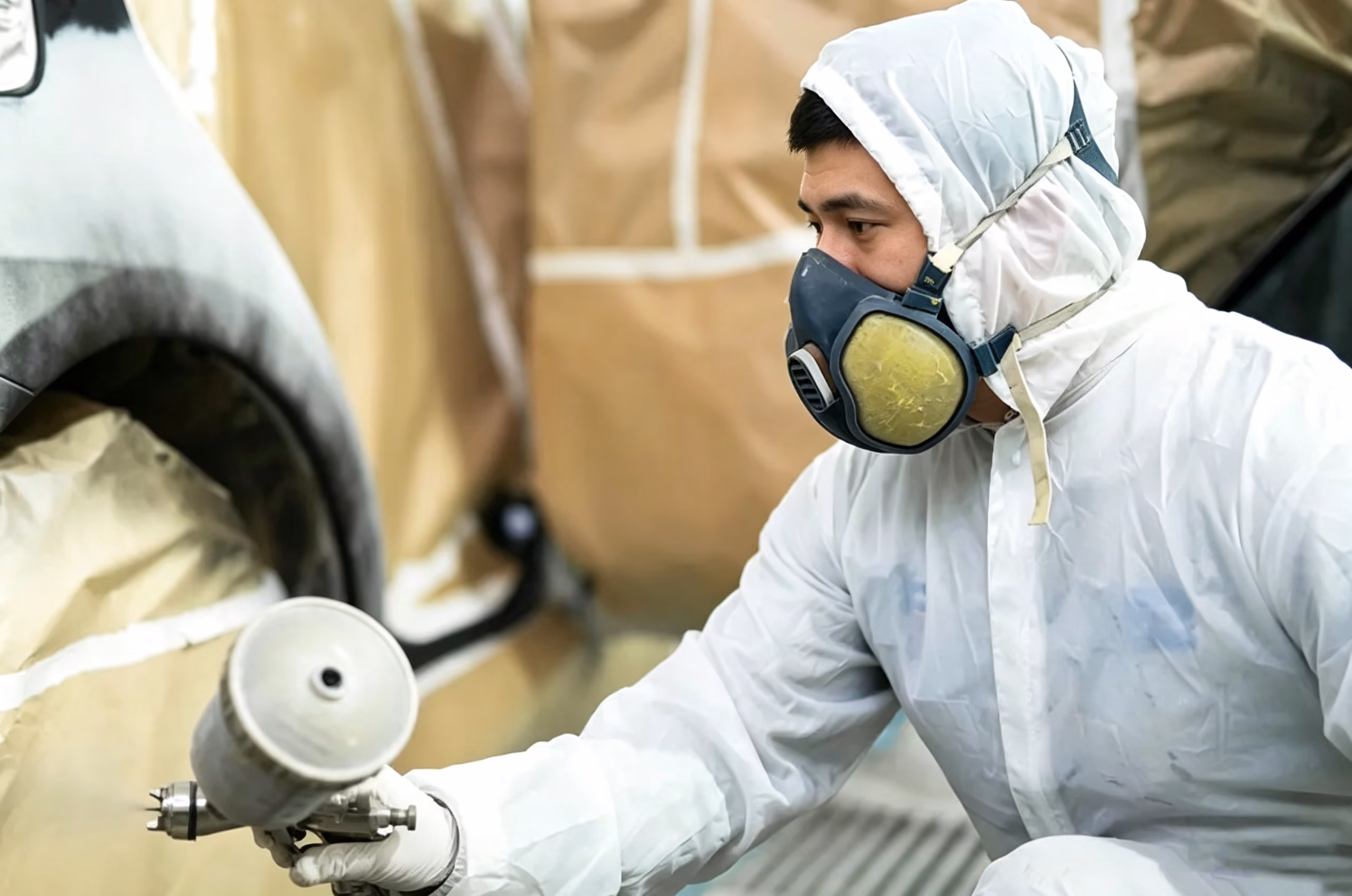 NewBeacon's food trailer manufacturing process: Multi-layer automotive-grade painting, applying anti-corrosion primer, mid-coat, and vibrant topcoat for optimal weather resistance.