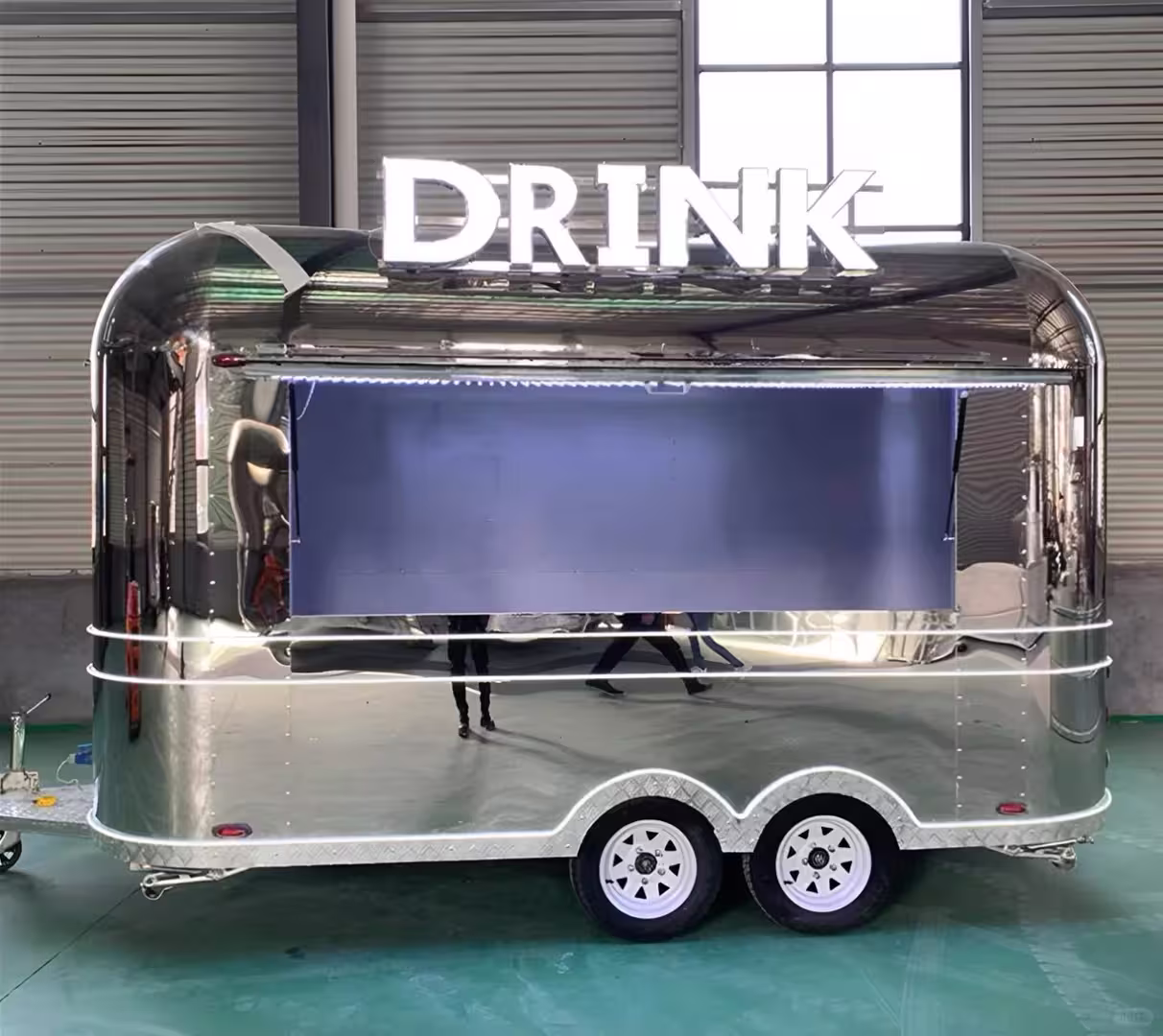 Mirror Stainless Steel Airstream Food Trailer | Custom Lemonade & Coffee Trailer for Sale