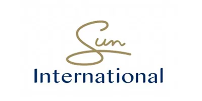 Sun International logo with stylized golden cursive 'Sun' above blue 'International' text.