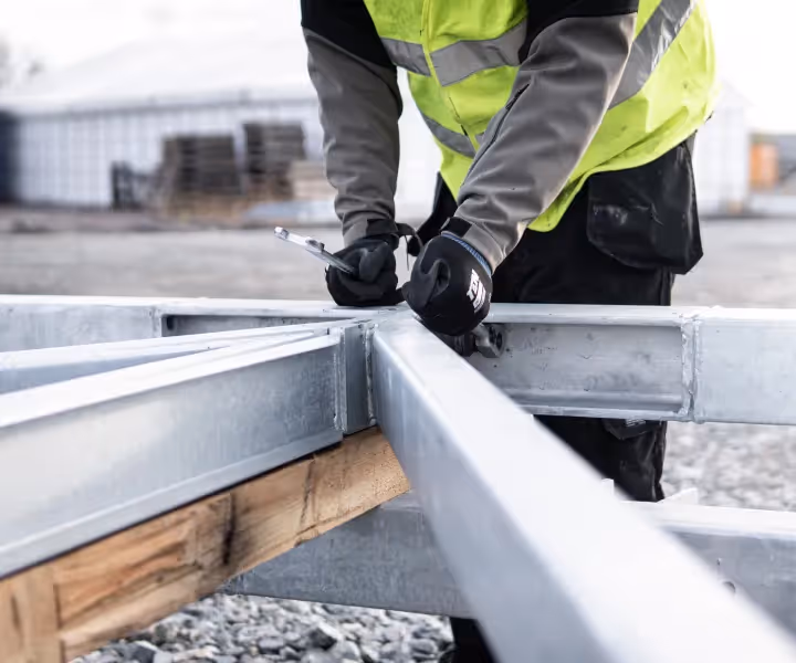 Worker tightening bolts