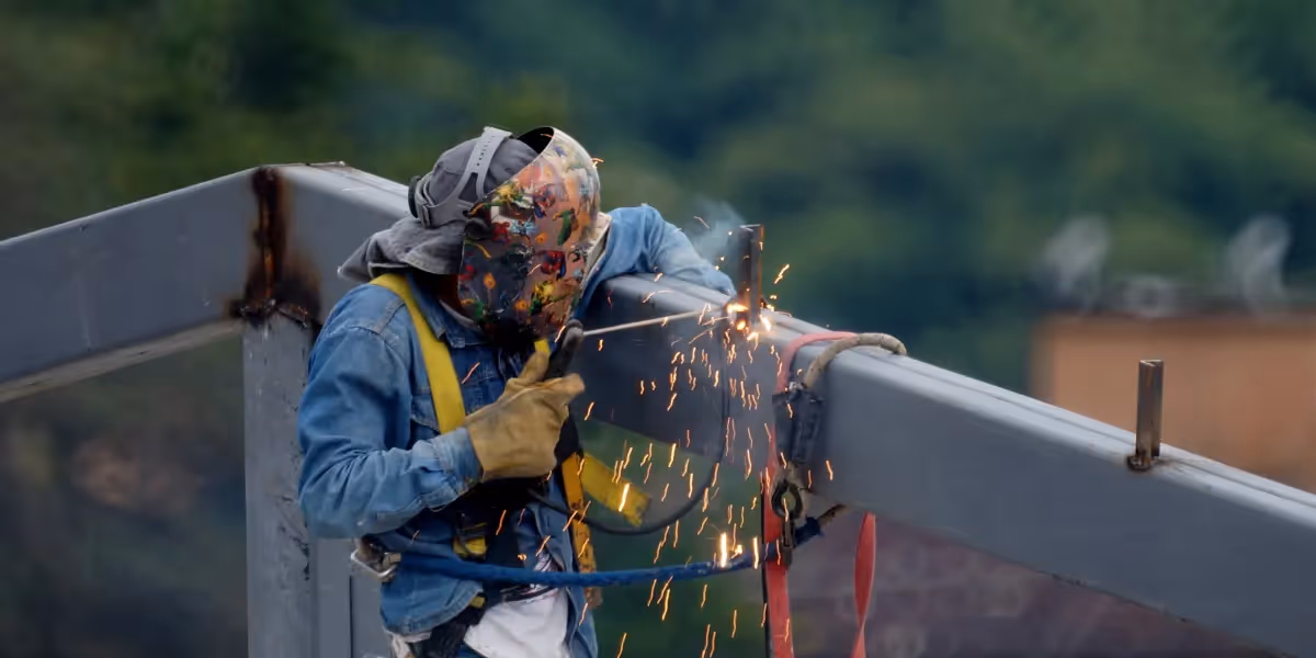Welder outside working on project