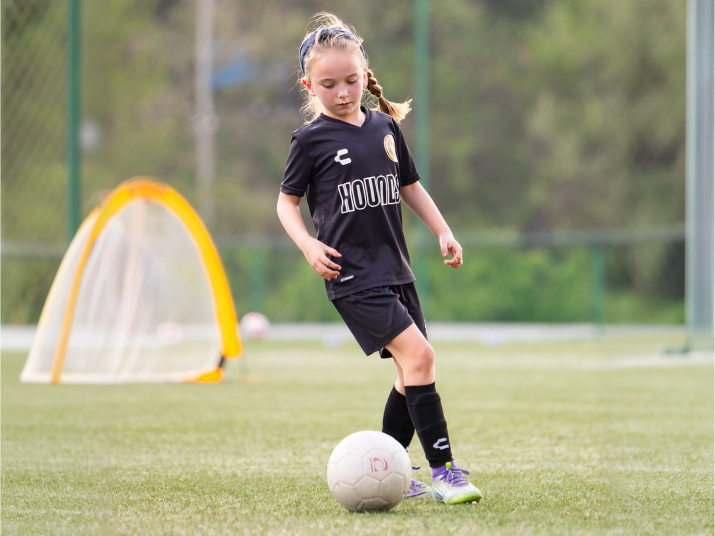 Player working with a coach during a private and small-group training session