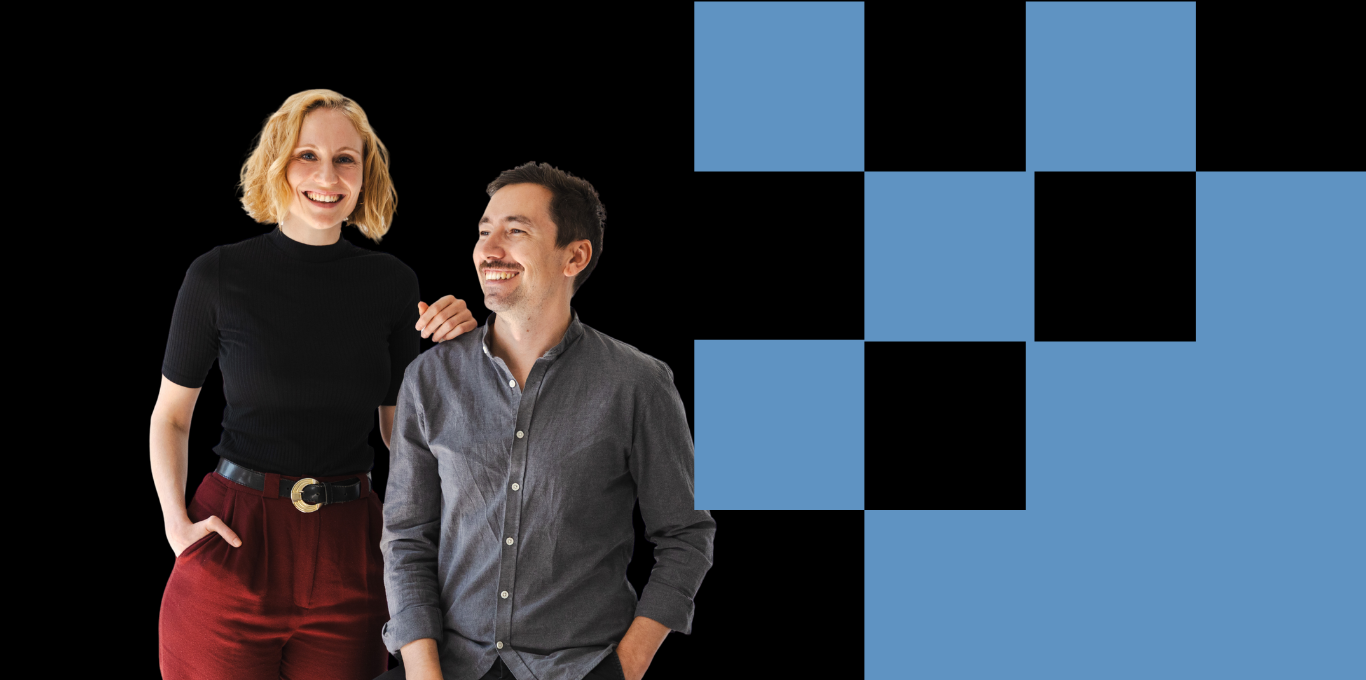 A picture of Nicole and Andreas, where they smile at each other. 