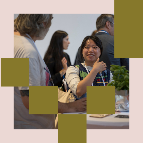 Two people talking to each other in a break.