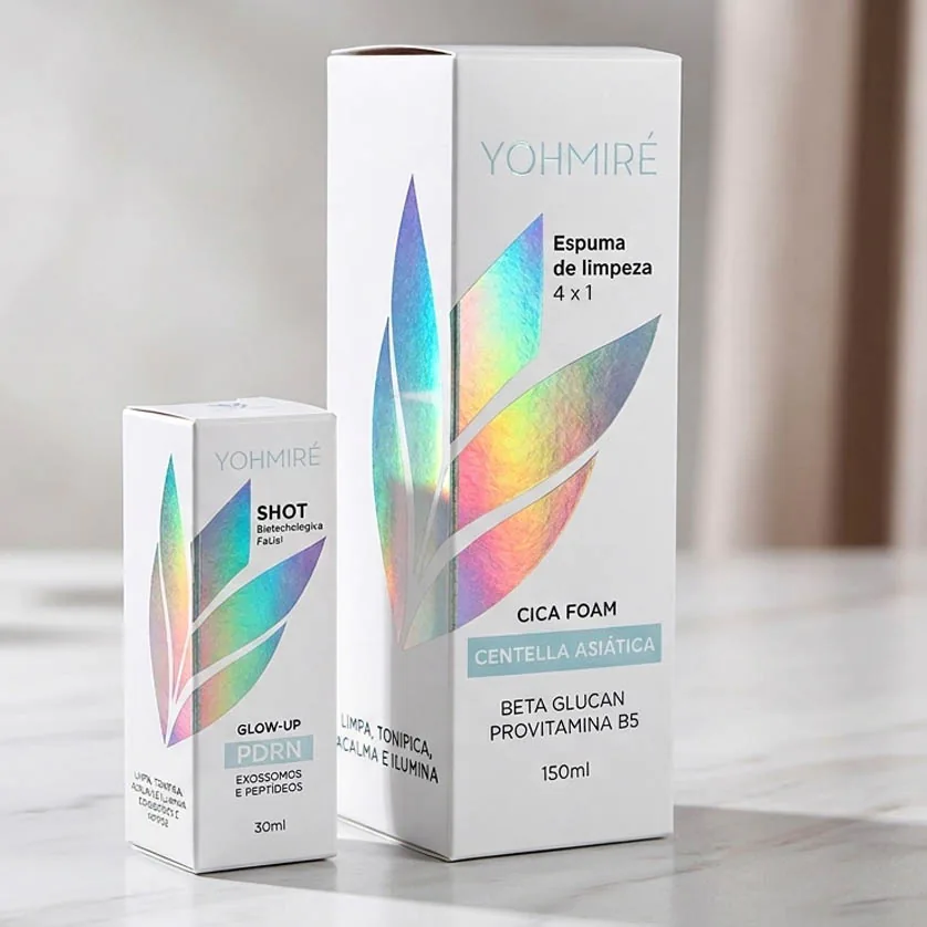 Cartuchos e embalagens de cosméticos com acabamento metalizado e engenharia de papelaria.