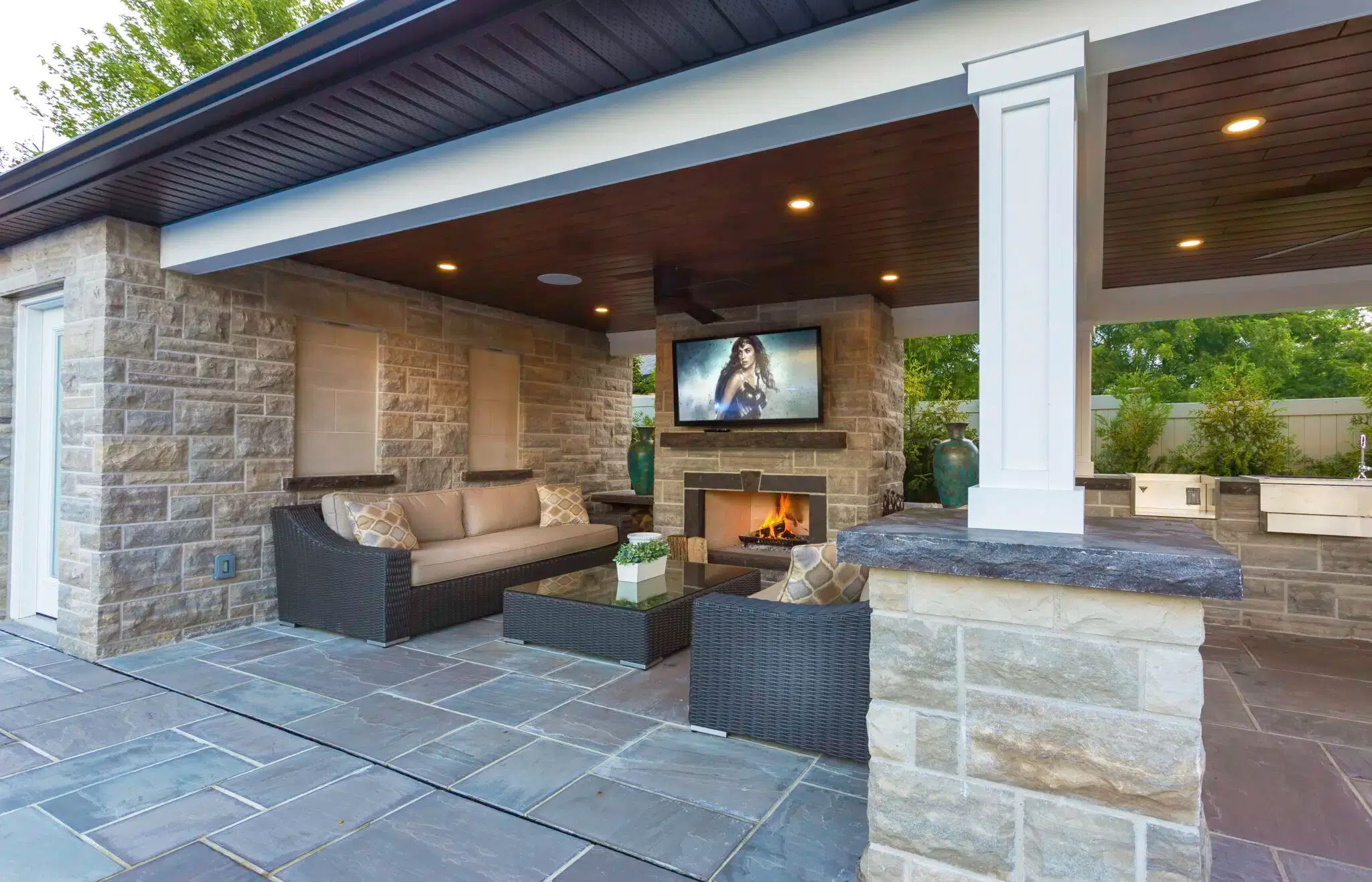 Outdoor Living Space Design With Covered Patio Fireplace