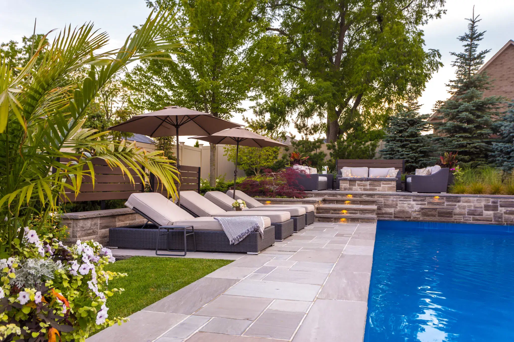 Paver Patio Design With Poolside Lounge Seating