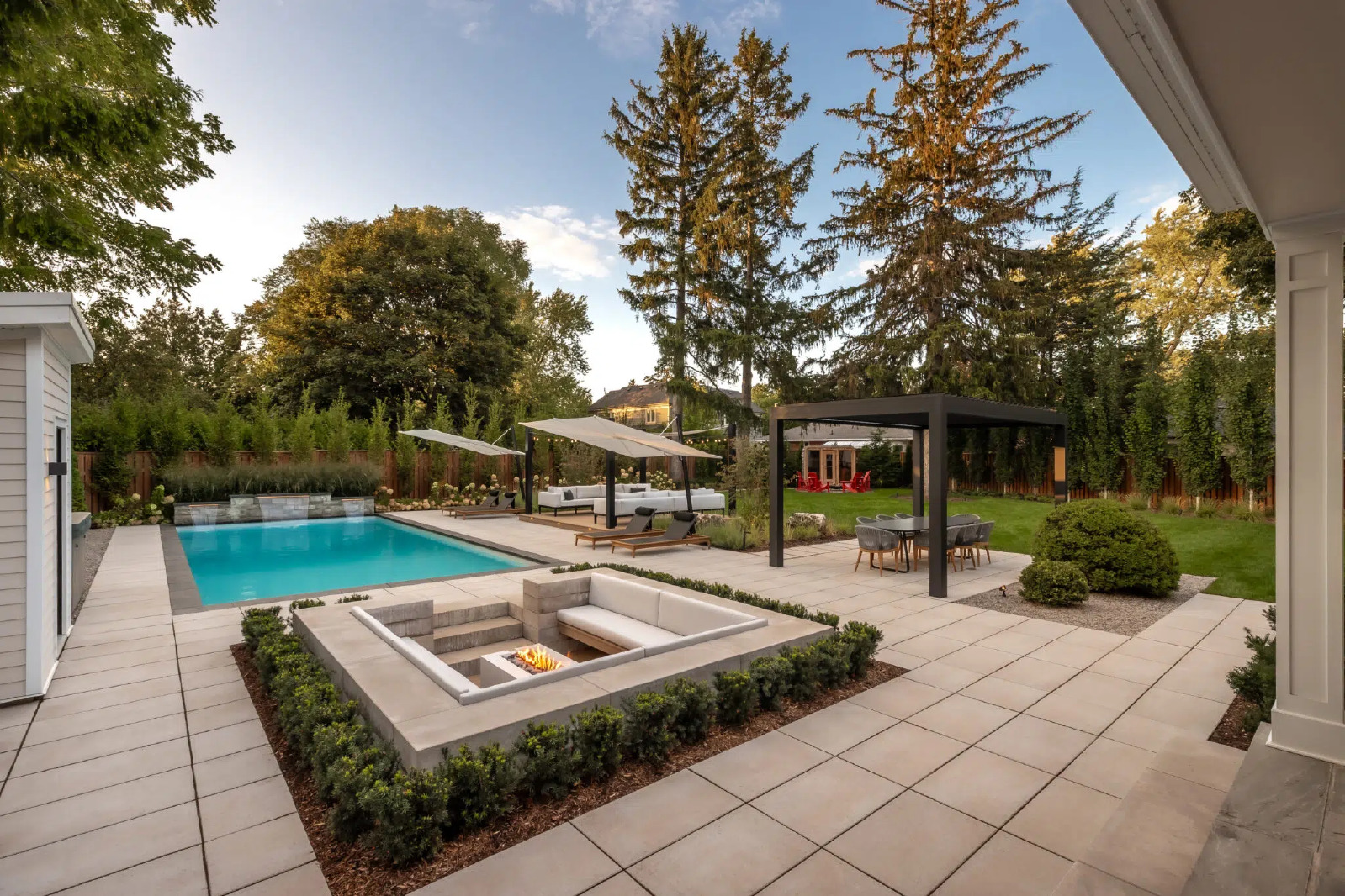 Outdoor Landscape Architect Designing Poolside Fire Pit Area
