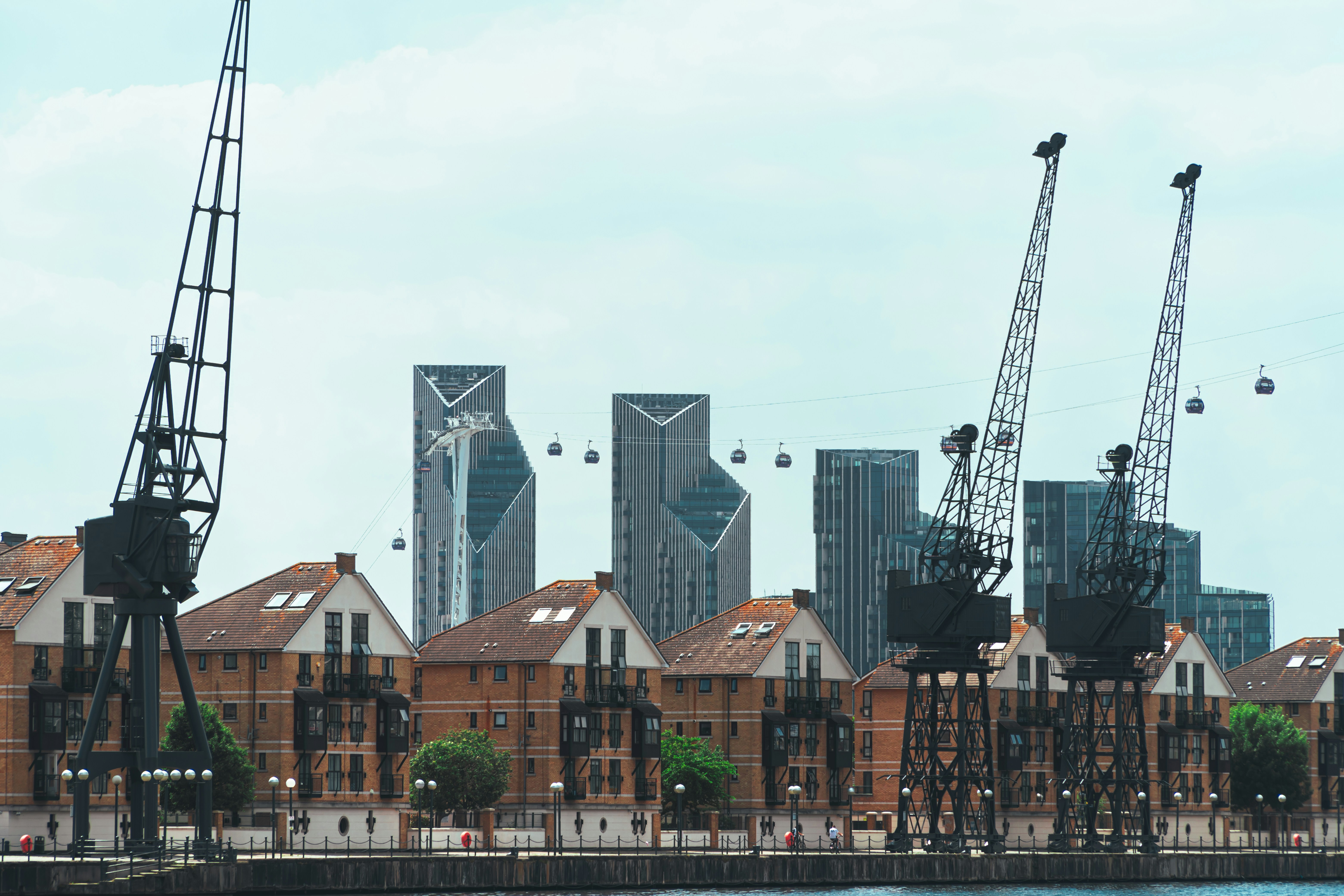 Cranes on the London waterfront, as HMRC publishes its UK CBAM guidance