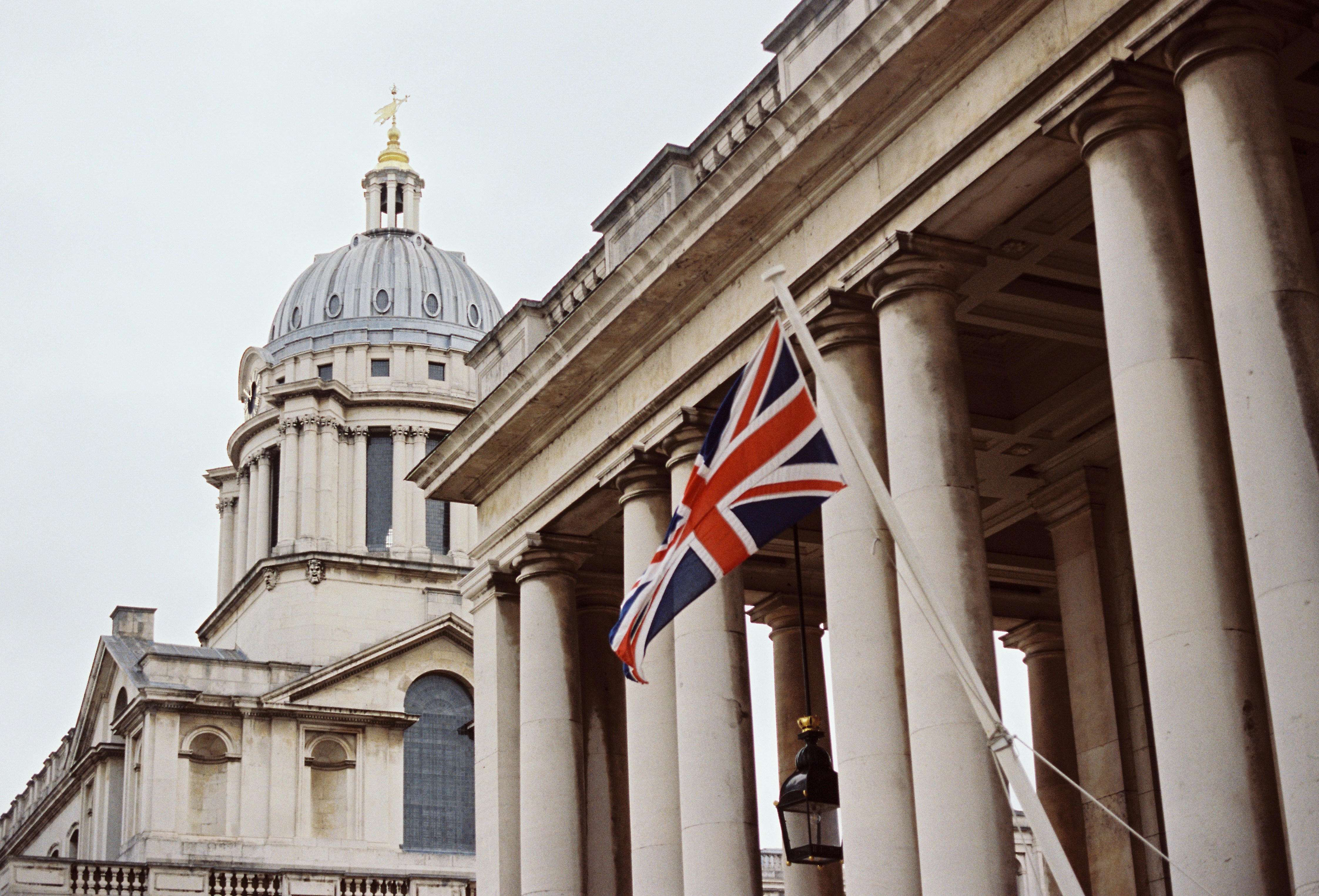 A classical colonnade with a Union flag, for the UK's second tranche of draft CBAM legislation