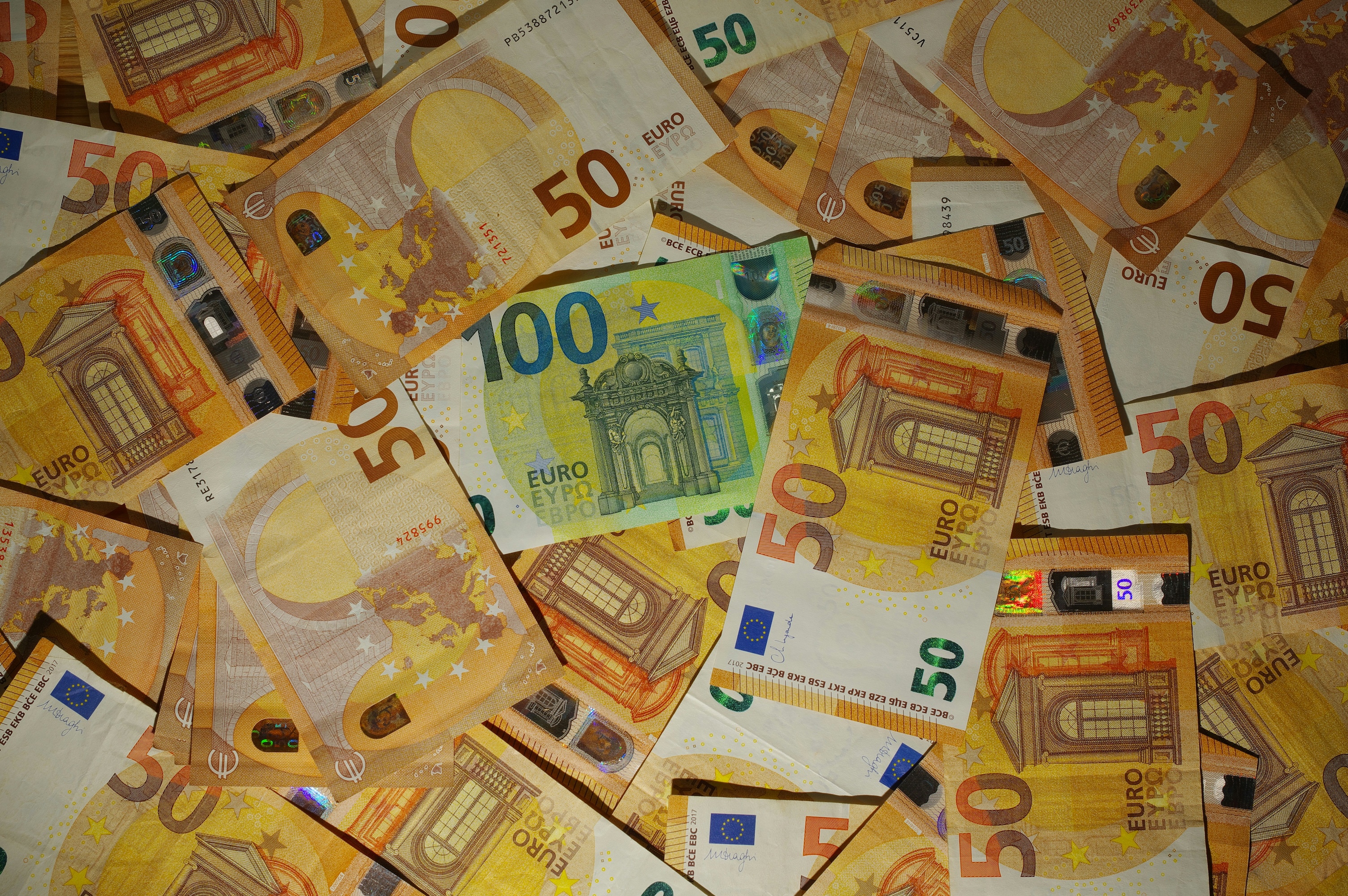 Euro banknotes, as the EU CBAM enters its definitive, paying phase