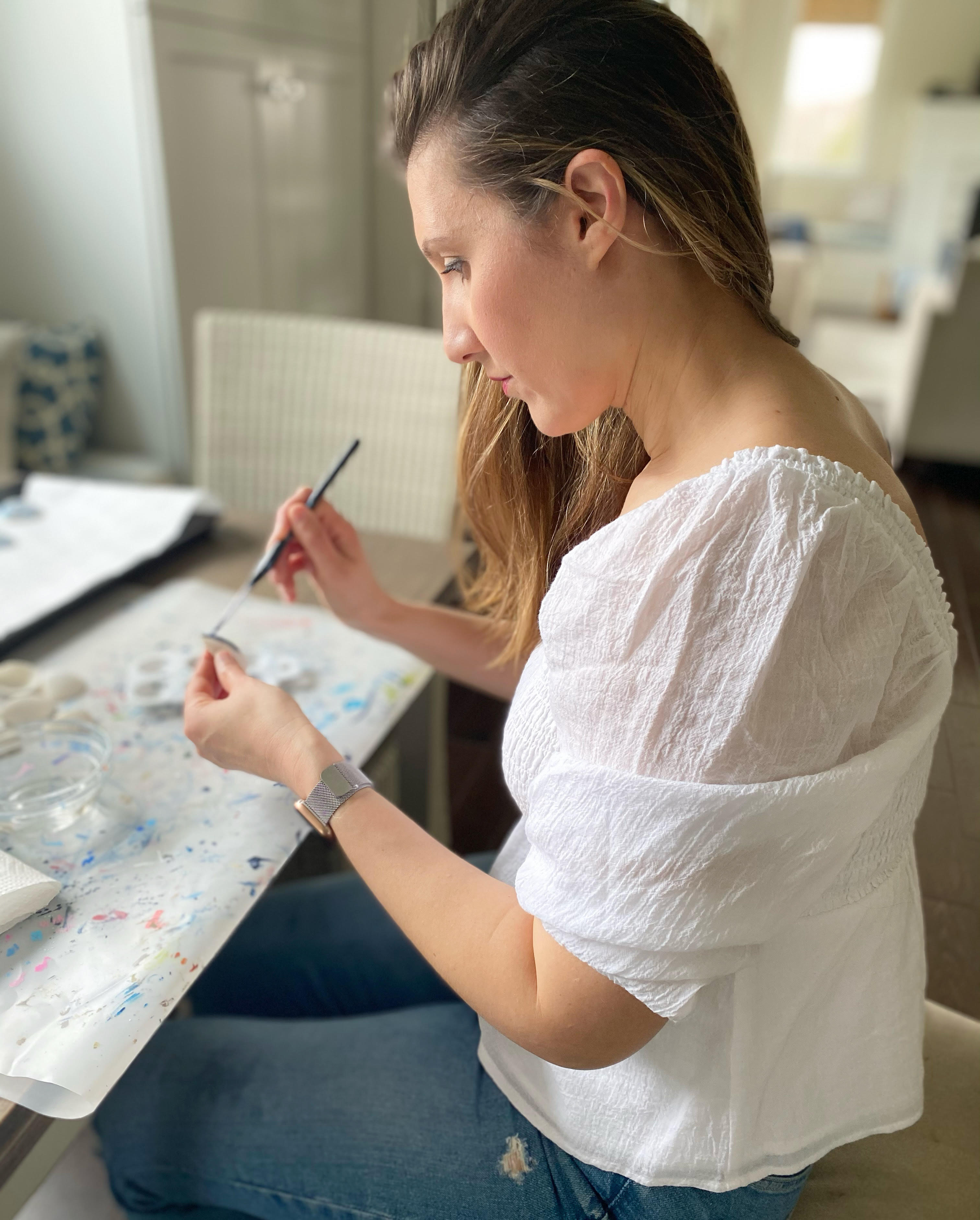 Roula Rallis hand painting seashells