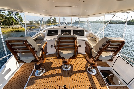 An image of the Helm chairs showing the back view on the ocean.