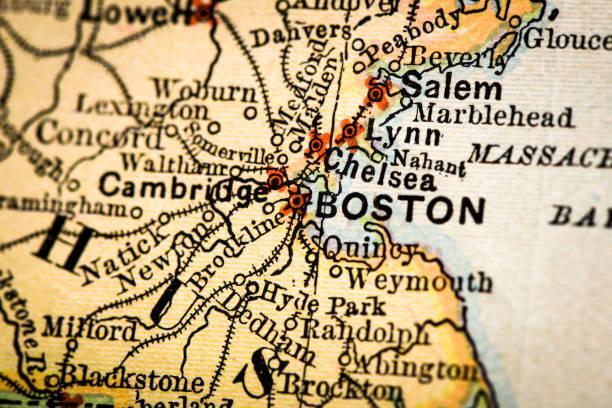 An image of an antique atlas map of Boston, Massachusetts.