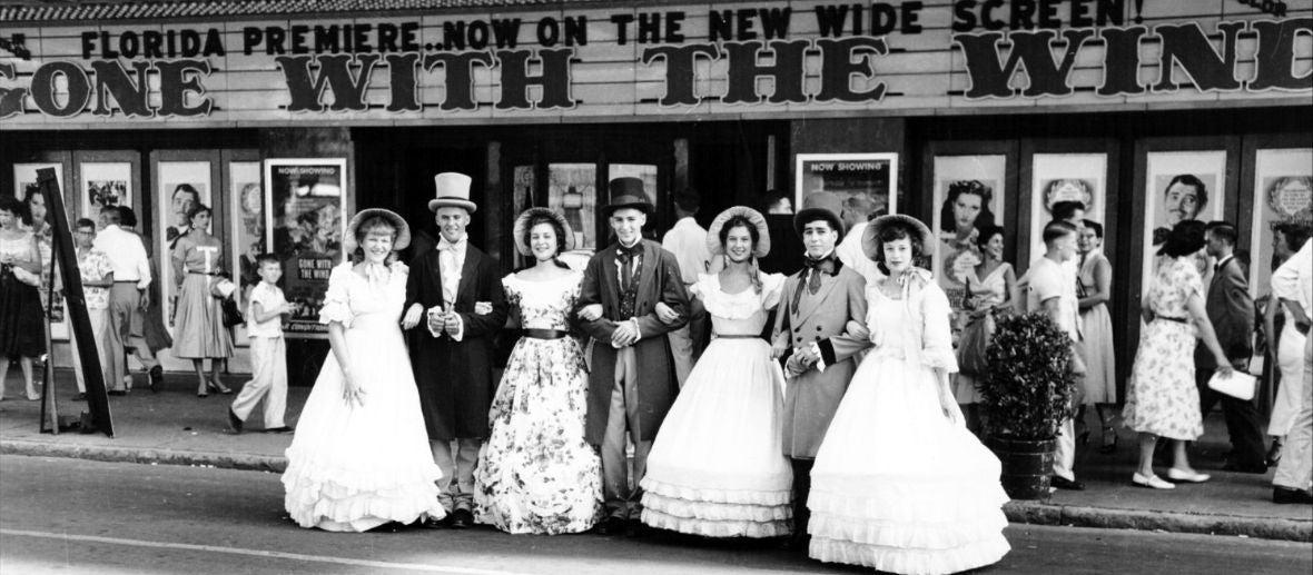 A group of people in formal attire