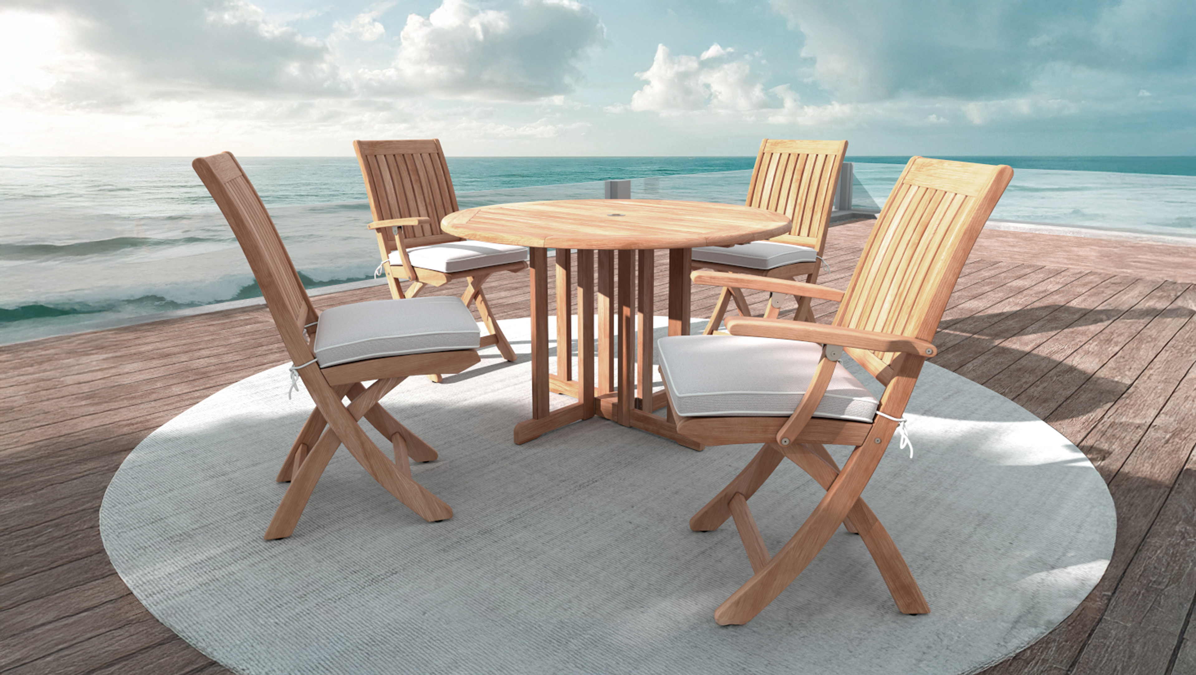teak outdoor chairs by the ocean
