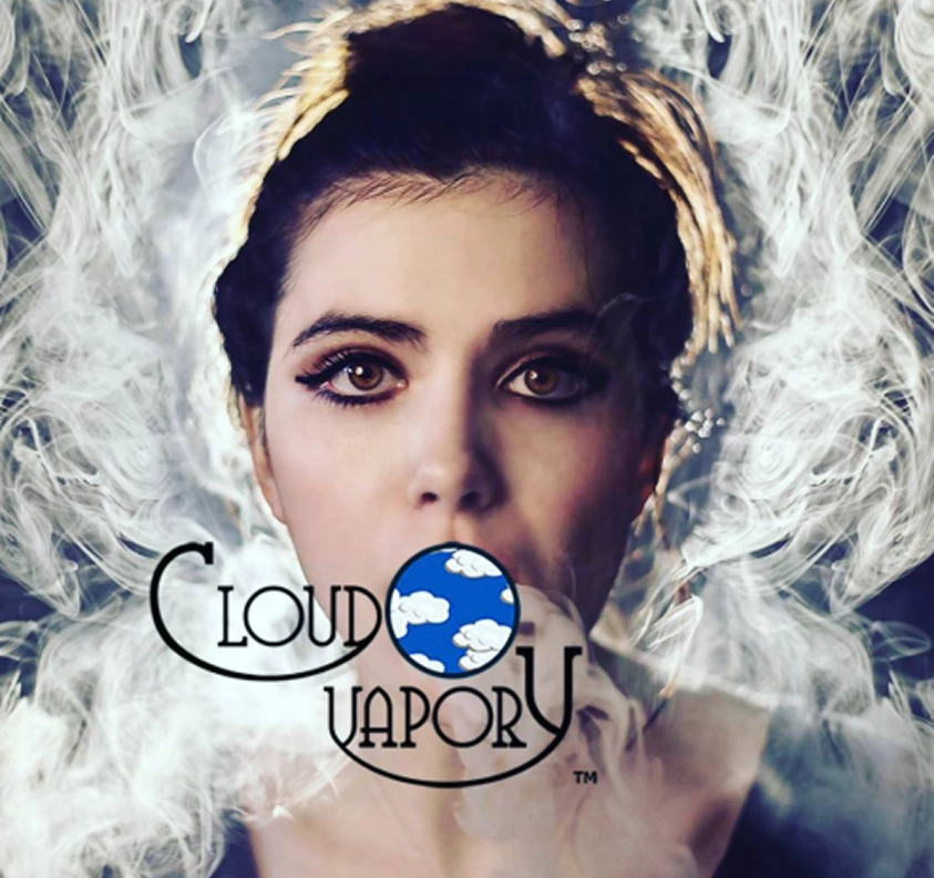 Woman exhaling vapor smoke with 'Cloud Vapory' logo featuring a blue circle with white clouds over the mouth area.