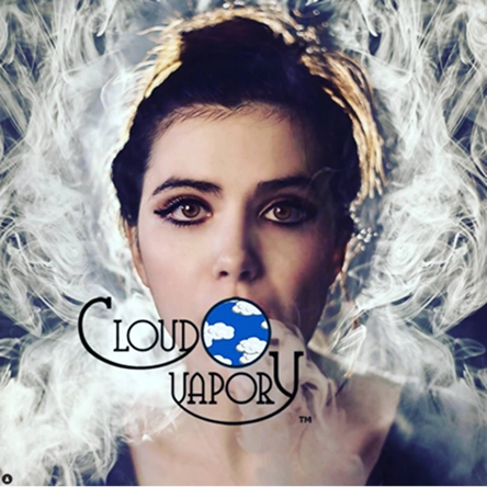 Woman exhaling vapor surrounded by clouds of smoke with Cloud Vapory logo overlay.