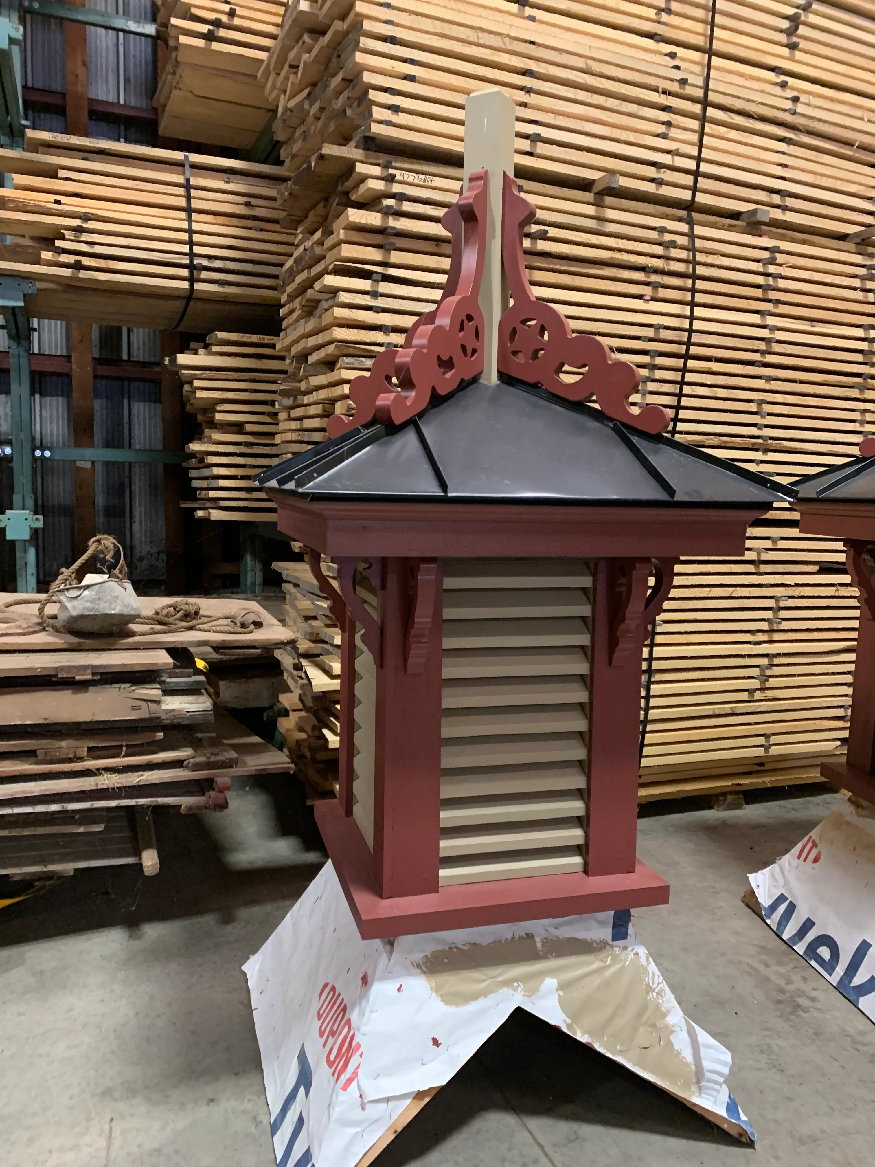 Ornate custom cupola with intricate design on its peak.