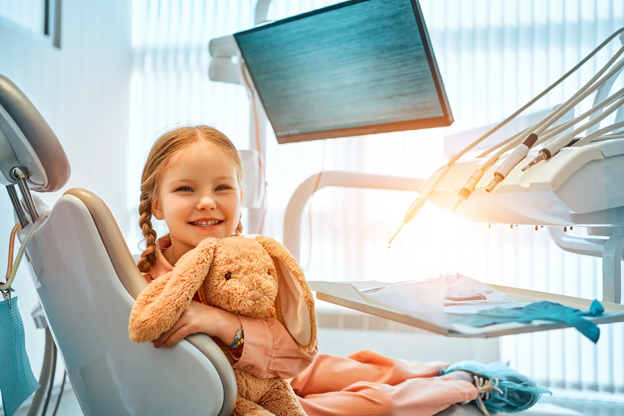 Child at a calm, sensory-friendly dental visit at Shiny Happy Smiles in St. Petersburg