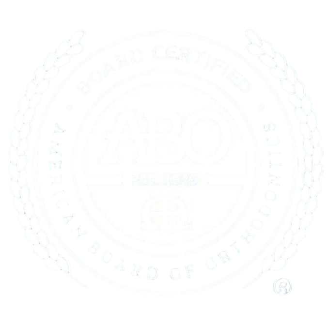 Seal of the American Board of Orthodontics with text 'Board Certified' and 'American Board of Orthodontics' surrounding ABO logo and 'Est. 1929'.