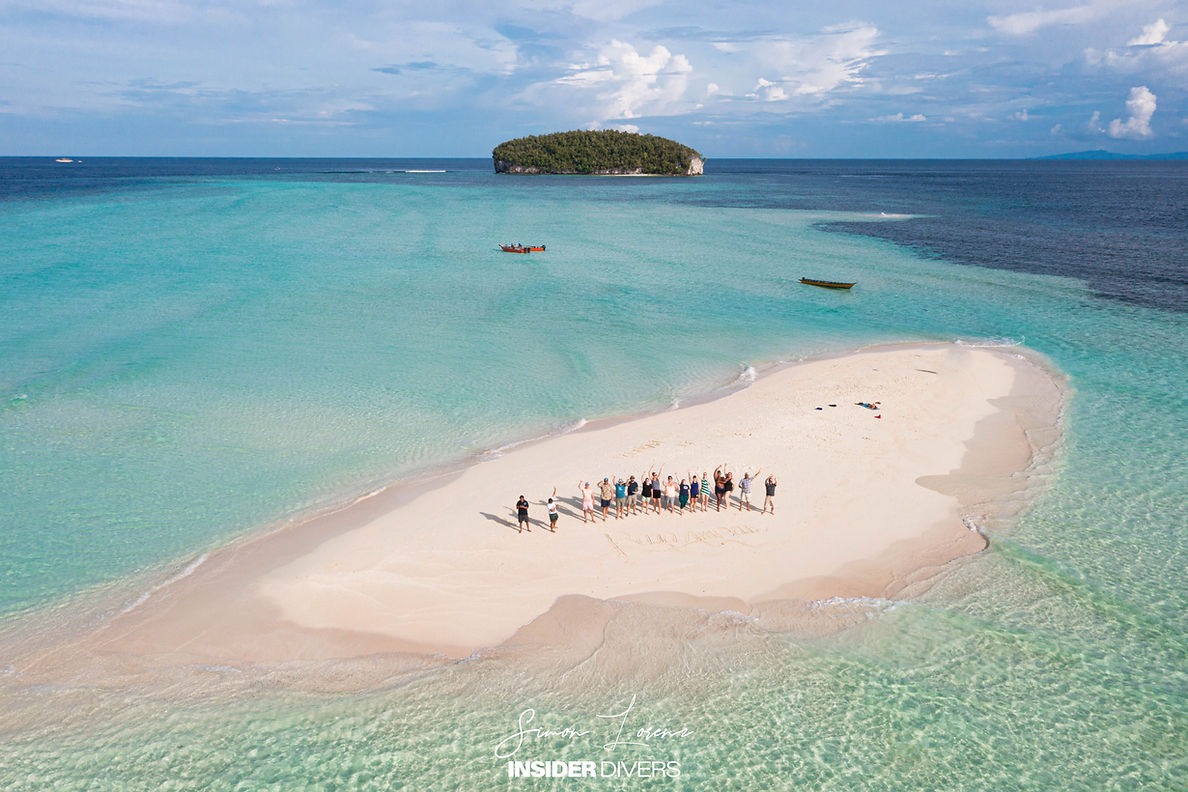 Insider Divers guests on a sandbank in central Raja Ampat