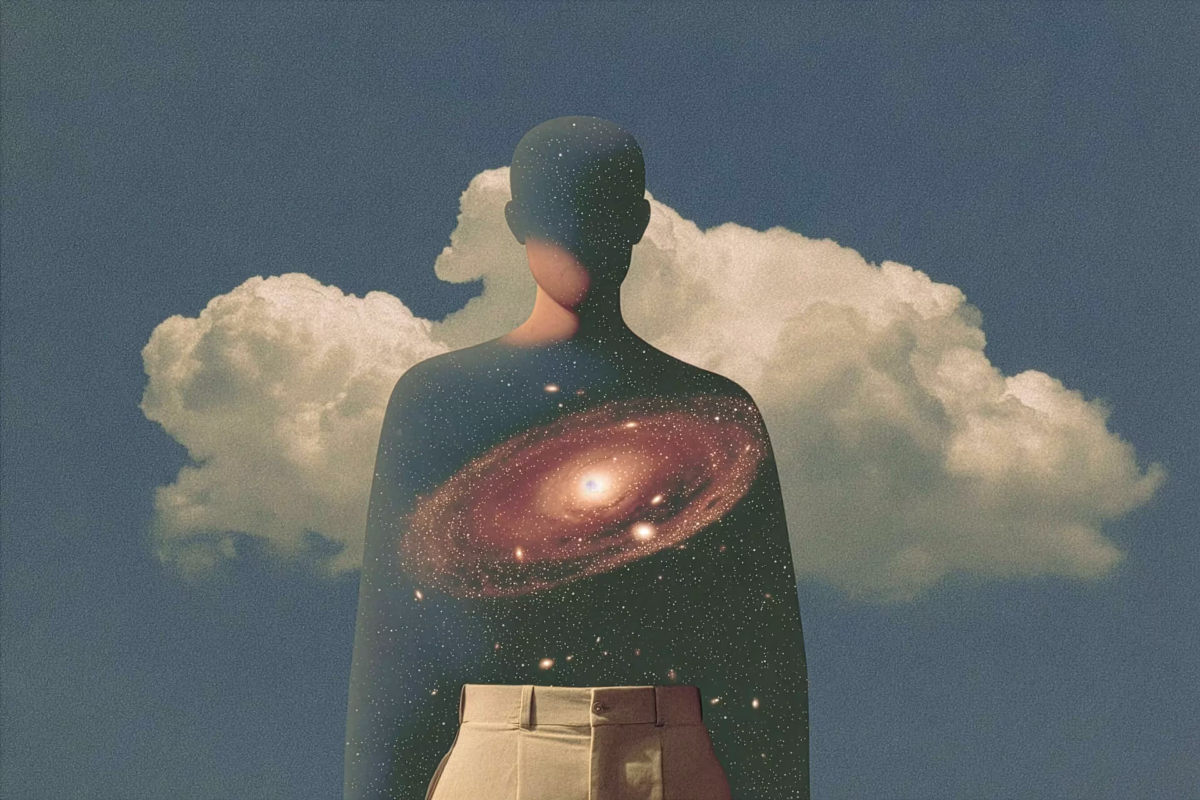 Silhouette of a person with a galaxy inside their body against a cloudy sky background.
