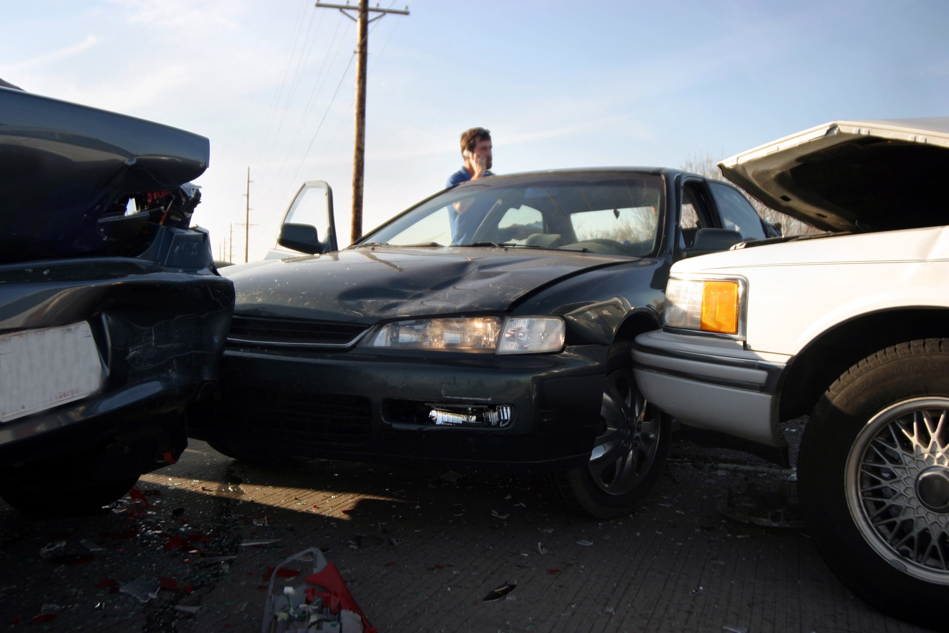 Tow Truck Assisting With A Vehicle Declared Total Loss After Crash