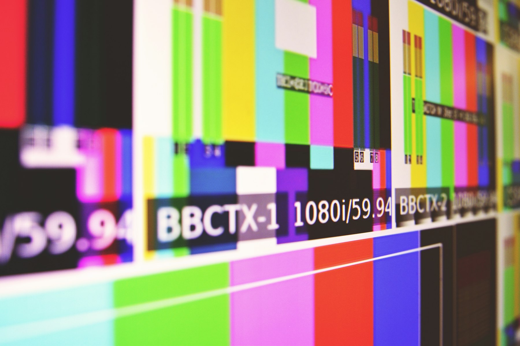 Broadcast test card color bars showing 1080i format labels