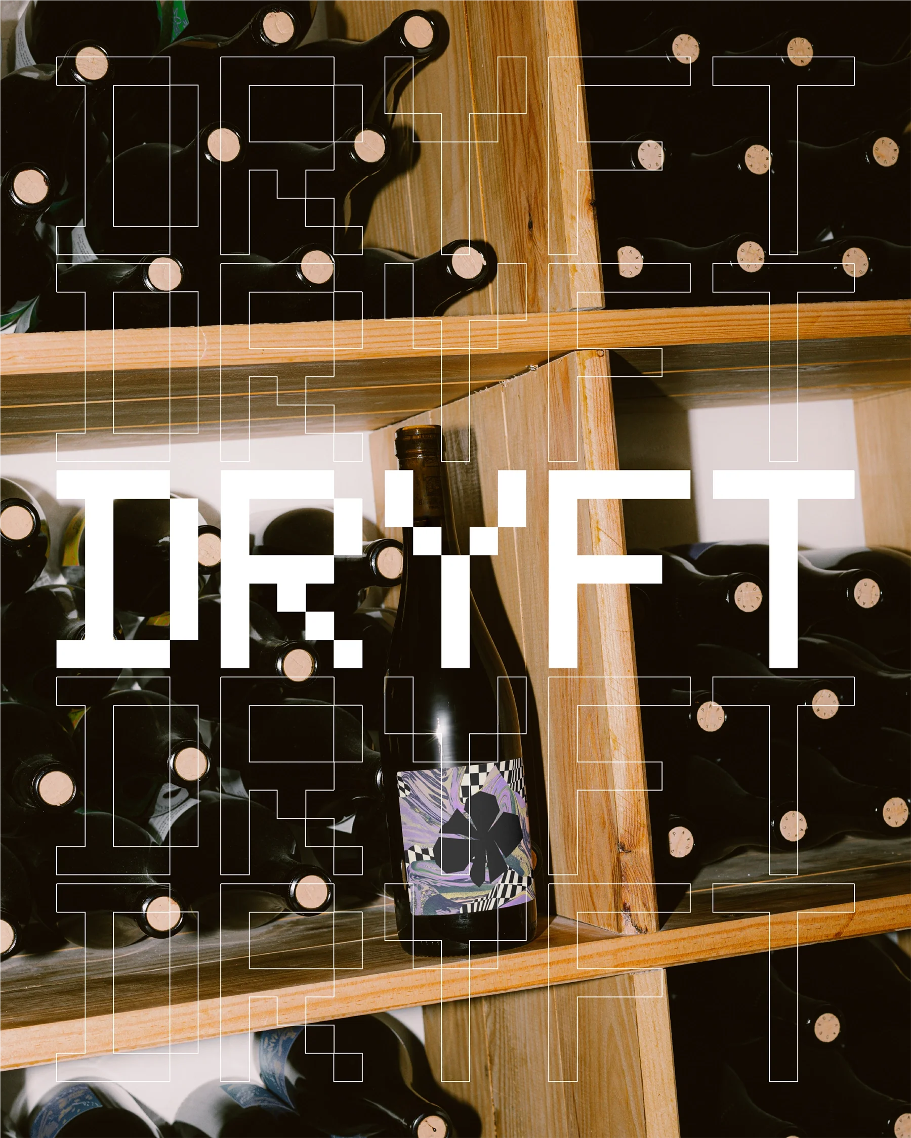Wooden shelves filled with horizontal rows of corked wine bottles and one bottle with a colorful label standing upright.