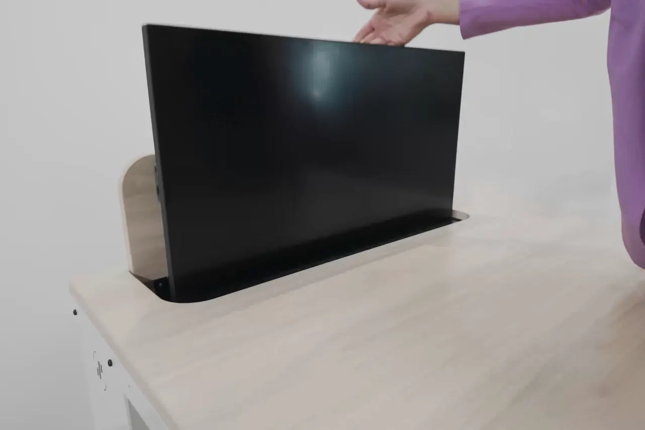 SMESK Lift: Der Monitor fährt per Gasdruckfeder aus der Tischplatte und wieder hinein.