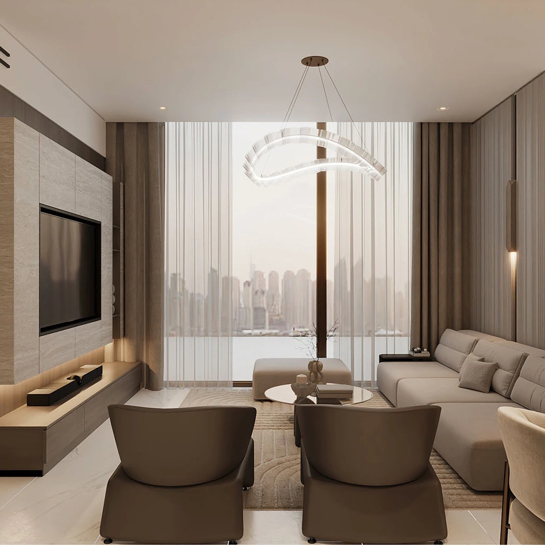 Modern living room with beige sofa, two brown chairs, round glass coffee table, large window with sheer curtains, and city skyline view.