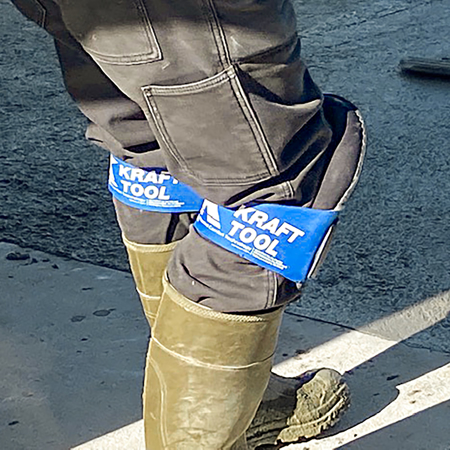 Kraft Tool knee pads being worn over pants and rubber work boots