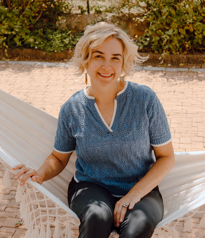 lindsey sitting on a hammock 1