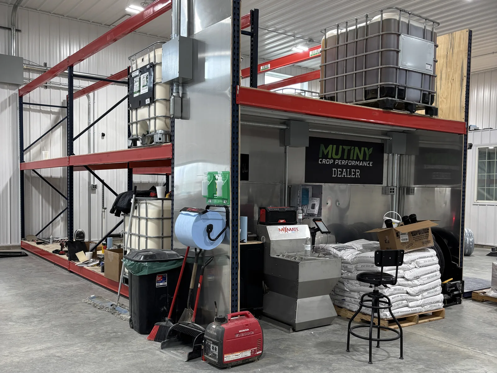 Dealer plant: Pro Inductor built into a tote rack with a stainless splash wall